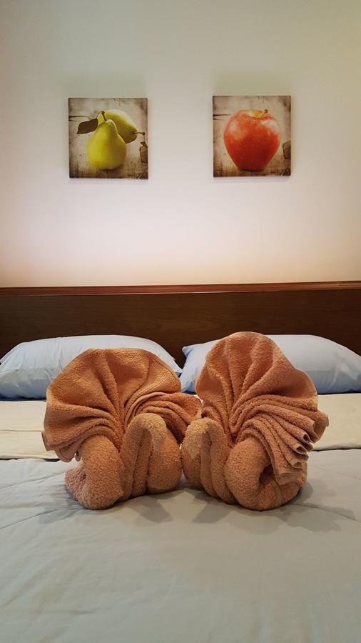 Nuch'S Apple Guest House Si Bun Ruang Buitenkant foto